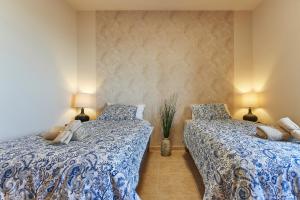 Ένα ή περισσότερα κρεβάτια σε δωμάτιο στο Casa La Luz