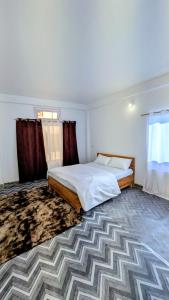 Ένα ή περισσότερα κρεβάτια σε δωμάτιο στο Accomoon hotels