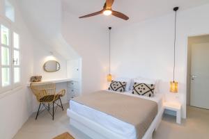 En eller flere senge i et værelse på Arnadian Living Experience