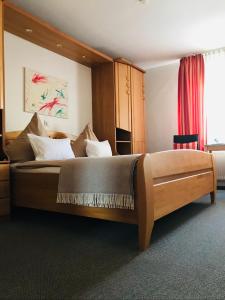 Una cama o camas en una habitación de Haus-Anka