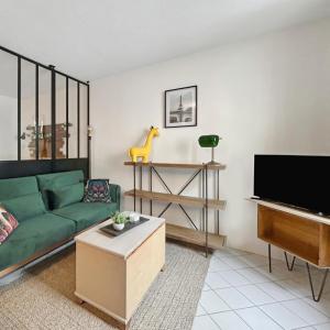 Et tv og/eller underholdning på Studio rénové, calme, commerces & RER à 5 min