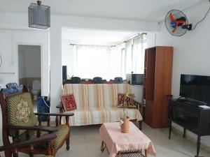 TV a/nebo společenská místnost v ubytování Gris Gris Apartment