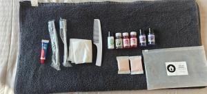a bunch of items are laid out on a table at Host Labs Homestay - Premium View in Bhīm Tāl