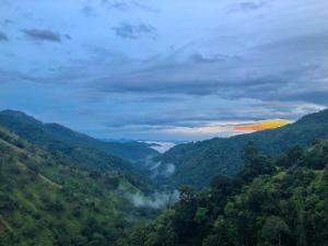 a view of a valley in the mountains at Monaco Tangalle in Nikawatawana
