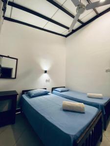 Ένα ή περισσότερα κρεβάτια σε δωμάτιο στο Chandra Holiday Home