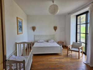 Ένα ή περισσότερα κρεβάτια σε δωμάτιο στο granval +9 φωτογραφίες