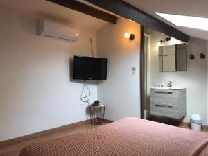 Μια τηλεόραση ή/και κέντρο ψυχαγωγίας στο L’escapade marine ensoleillée