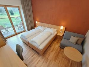 Postel nebo postele na pokoji v ubytování Gästezimmer Familie Fries