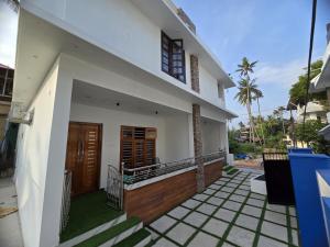 a view of the front of a house at Karthik Villa in Varkala