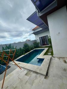 Πισίνα στο ή κοντά στο Elegant Jaden Villa Cemagi