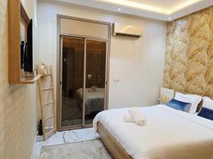 Postel nebo postele na pokoji v ubytování Azur appartement essaouira