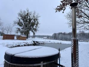 Ranczo Rogowo jacuzzi sauna łowisko v zimě