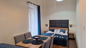 En eller flere senge i et værelse på Skalnica- apartamenty z widokiem na góry, przy szlakach