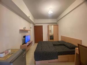 En eller flere senge i et værelse på LYSroom