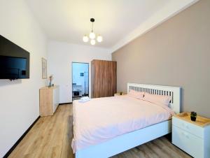 Ένα ή περισσότερα κρεβάτια σε δωμάτιο στο Socoleni City Flat