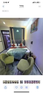 a bedroom with a bed and two chairs in it at Hotel Himalayan Residency in Jāmb