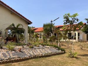 Κήπος έξω από το Hôtel Éden Roc Ivoire