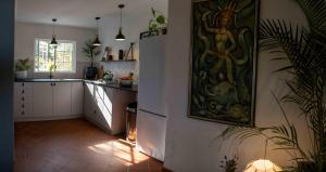 Kuchyň nebo kuchyňský kout v ubytování LaVera Oriole Cottage