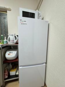 Η κουζίνα ή μικρή κουζίνα στο 羽憩館 Hakeikan KIX