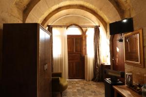 Kuchyň nebo kuchyňský kout v ubytování Artium Cave Hotel