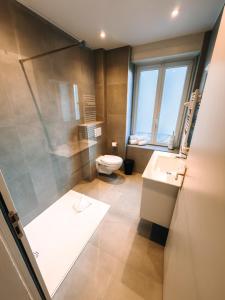 Et badeværelse på Appartement Hyper Centre Moderne - French Luxury