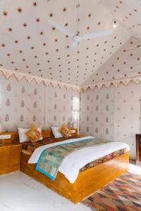 En eller flere senge i et værelse på malik tour & travel jaisalmer