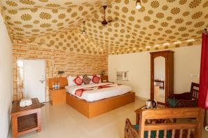 En eller flere senge i et værelse på malik tour & travel jaisalmer