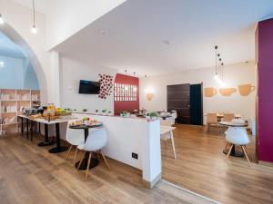 Kuchyň nebo kuchyňský kout v ubytování B&B Hotel Trieste