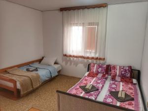 Ένα ή περισσότερα κρεβάτια σε δωμάτιο στο Apartment Boka