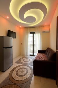 Μια τηλεόραση ή/και κέντρο ψυχαγωγίας στο Al FAHAD private apartments for rent