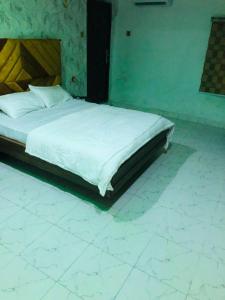 Ένα ή περισσότερα κρεβάτια σε δωμάτιο στο LuxApartments