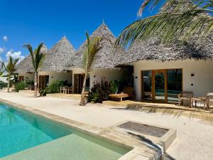 Πισίνα στο ή κοντά στο GARDEN EDEN Lodge