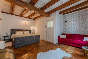 En eller flere senge i et værelse på Heritage Loft 1735