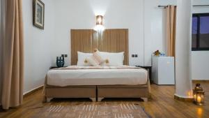 Postel nebo postele na pokoji v ubytování Eden villa Marrakech + 53 fotografií