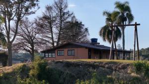 Κήπος έξω από το Paraíso no Campo - Lago, Festa e Hospedagem