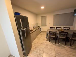 Η κουζίνα ή μικρή κουζίνα στο Departamento dulce 3