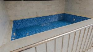 Πισίνα στο ή κοντά στο فندق بونسيانا - Poinciana Hotel