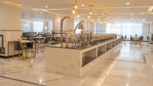 Εστιατόριο ή άλλο μέρος για φαγητό στο فندق بونسيانا - Poinciana Hotel