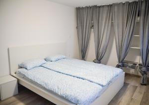 Postel nebo postele na pokoji v ubytování Jacuzzi & Vineyard Retreat