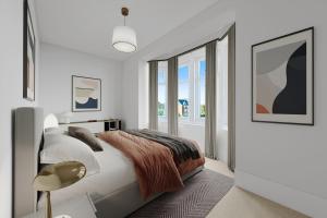 En eller flere senge i et værelse på Mode - The Old School House