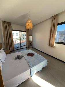 Ένα ή περισσότερα κρεβάτια σε δωμάτιο στο Atlantic view Tamraght 2