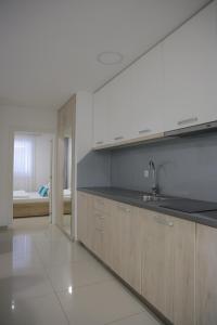 Nhà bếp/bếp nhỏ tại Panorama apartments +150 ảnh