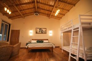 Ένα ή περισσότερα κρεβάτια σε δωμάτιο στο Omaya Vista