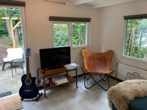 Et tv og/eller underholdning på Natuurhuisje De Boshut