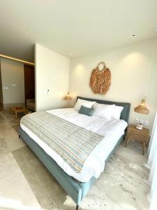 Ένα ή περισσότερα κρεβάτια σε δωμάτιο στο Estudio 104 en Distrito Puerto +21 φωτογραφίες