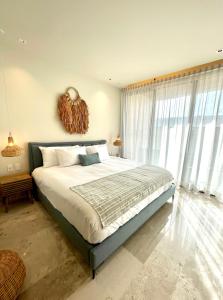 Ένα ή περισσότερα κρεβάτια σε δωμάτιο στο Estudio 104 en Distrito Puerto