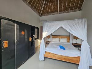 En eller flere senge i et værelse på Villa 3 chambres Angie