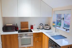 Køkken eller tekøkken på The Cotswold Luxe Cottage + 6 billeder