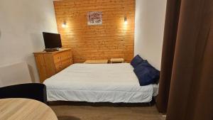 Ένα ή περισσότερα κρεβάτια σε δωμάτιο στο Orelle 3 Vallées - Studio 4 personnes +6 φωτογραφίες