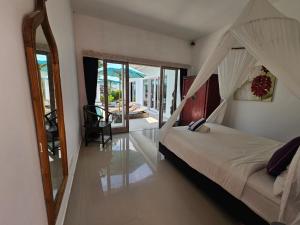Giường trong phòng chung tại Villa Matahari +31 ảnh
